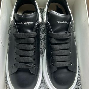 Alexander McQueen’s with a beautiful black and white leather and fat bottom